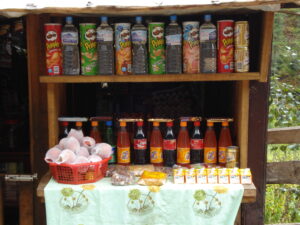A home store on the Nepal trekking track with Coke, Fanta and Water and snacks